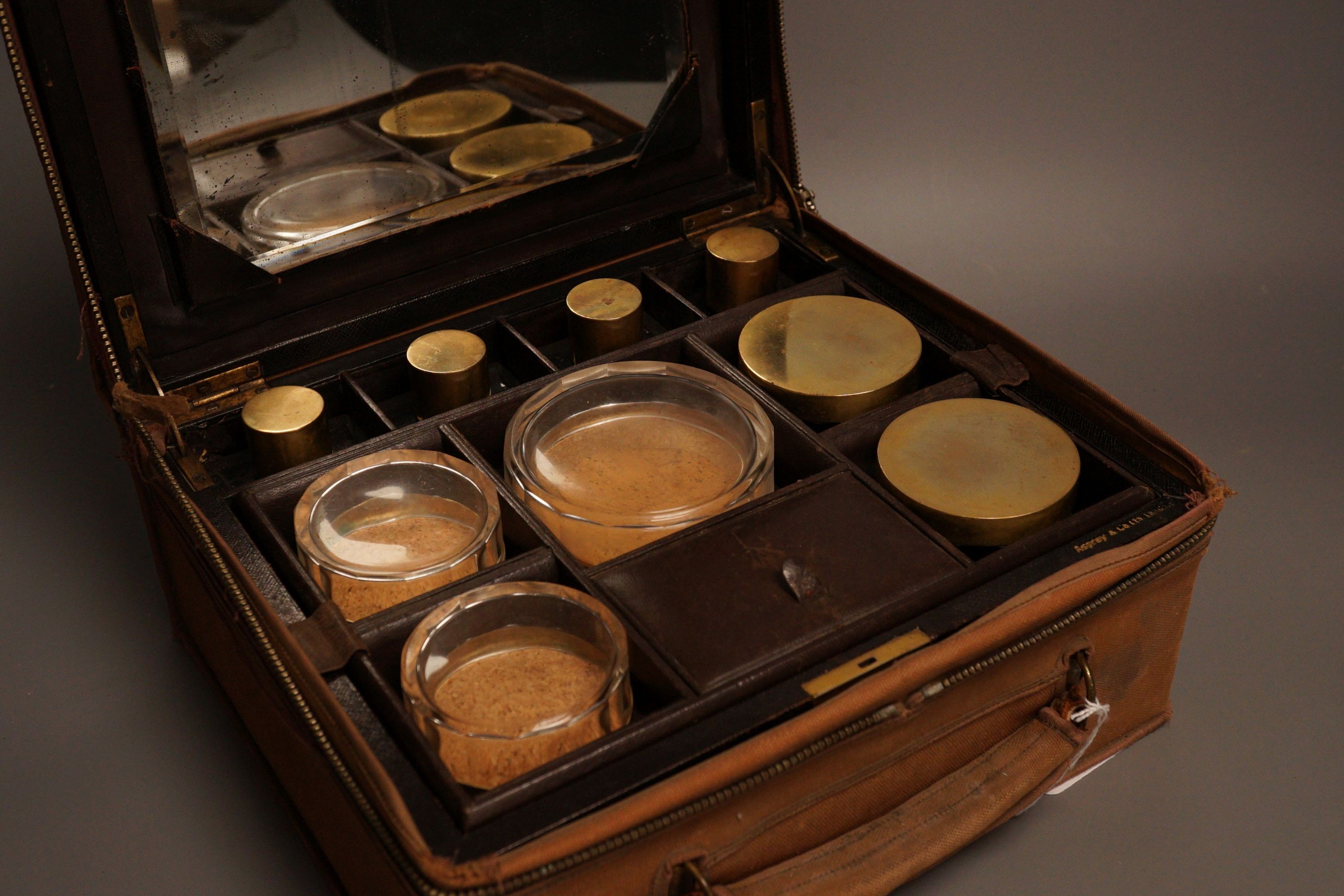 An Asprey & Co. leather clad travelling vanity case